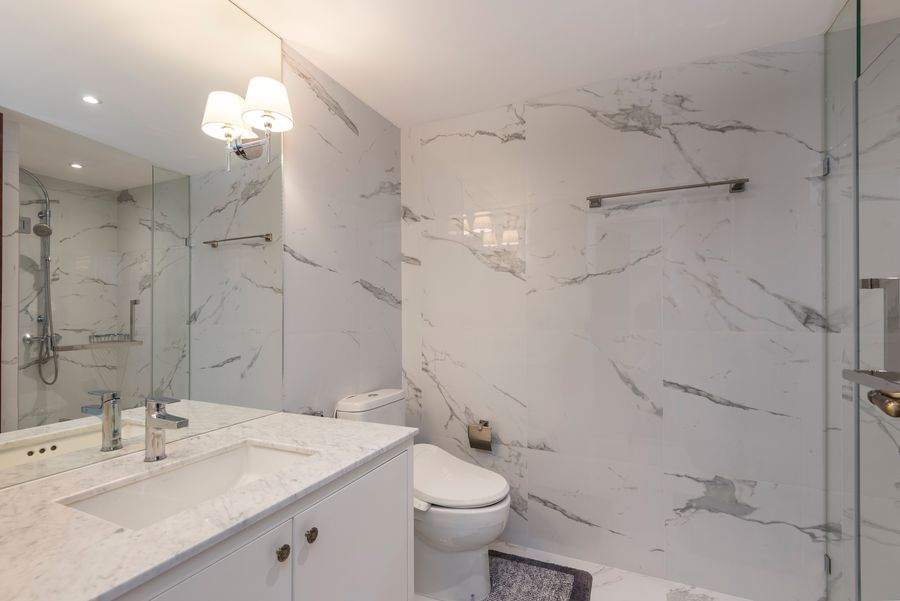 Marble bathroom detail with a marble topped vanity