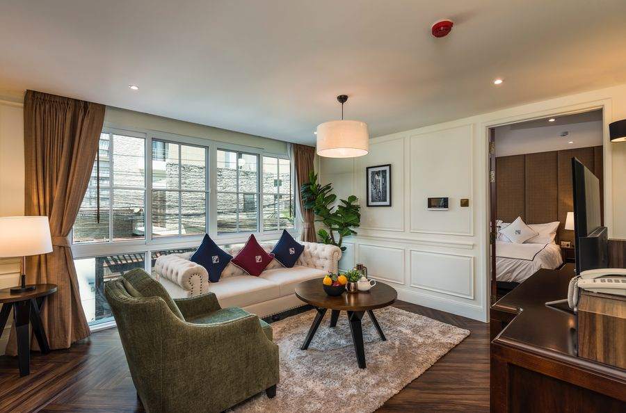 The living room with the bedroom door open