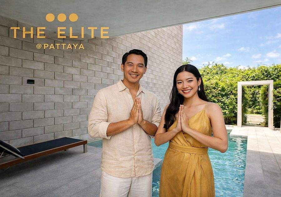The Elite @ Pattaya welcome image, two hosts greeting guests with a wai beside the private pool, under the gold Elite at Pattaya wordmark